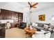 Comfortable living room with built-in shelving, and a round wooden table at 3150 Shumard Way, Marietta, GA 30064