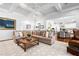 Spacious living room with coffered ceilings, an open layout, and a large, comfortable sectional sofa at 3150 Shumard Way, Marietta, GA 30064