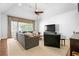 Bright living room featuring neutral paint, large windows, and a ceiling fan at 3150 Shumard Way, Marietta, GA 30064