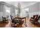 Bright office with hardwood floors, wainscoting, large windows, and classic furniture at 3150 Shumard Way, Marietta, GA 30064