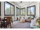 Bright sunroom with floor to ceiling windows and comfortable seating at 3150 Shumard Way, Marietta, GA 30064