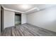A large open basement space with gray walls and wood look floors at 3310 Forest Creek Sw Dr, Marietta, GA 30064