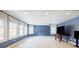Empty basement space featuring numerous windows bringing in natural light, ideal for a recreational space at 656 Gunby Se Rd, Marietta, GA 30067