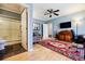 Bedroom with an adjacent bathroom featuring a shower, toilet, and modern fixtures at 656 Gunby Se Rd, Marietta, GA 30067