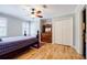 Bedroom featuring hardwood floors, large windows, and ample closet space at 656 Gunby Se Rd, Marietta, GA 30067