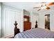 Bedroom with hardwood floors, ample closet space, and traditional furnishings at 656 Gunby Se Rd, Marietta, GA 30067