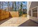 Sunlit spacious wooden deck, ideal for relaxing or gatherings with secure fencing and home access at 656 Gunby Se Rd, Marietta, GA 30067
