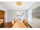 Elegant dining room with hardwood floors and bright natural light at 656 Gunby Se Rd, Marietta, GA 30067