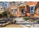 Charming front entrance with brick walkway and well-kept landscaping at 656 Gunby Se Rd, Marietta, GA 30067