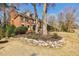 Two story brick home with mature trees and landscape at 656 Gunby Se Rd, Marietta, GA 30067
