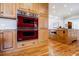 Gourmet kitchen features Viking double ovens, granite countertops and wood cabinetry at 656 Gunby Se Rd, Marietta, GA 30067
