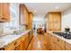 Well-appointed kitchen featuring stainless steel appliances, granite countertops, and wood cabinetry at 656 Gunby Se Rd, Marietta, GA 30067