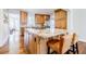 Spacious kitchen featuring a large center island with granite countertops, and wood cabinets at 656 Gunby Se Rd, Marietta, GA 30067