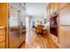 Modern kitchen with stainless appliances, double ovens, and hardwood floors throughout at 656 Gunby Se Rd, Marietta, GA 30067