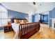 Spacious main bedroom with wood floors and a view into another room at 656 Gunby Se Rd, Marietta, GA 30067