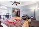 Spacious home office with natural light, hardwood floors, and a comfortable seating area at 656 Gunby Se Rd, Marietta, GA 30067