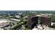 A captivating aerial view showcases the commercial buildings, surrounded by lush green trees and a cityscape backdrop at 95 Mount Vernon Cir, Atlanta, GA 30338