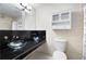 Contemporary bathroom featuring dual glass bowl sinks and sleek fixtures at 95 Mount Vernon Cir, Atlanta, GA 30338