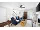 Charming living room features a ceiling fan, hardwood floors and natural light at 95 Mount Vernon Cir, Atlanta, GA 30338