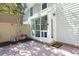 Charming sunroom access with brick patio, privacy fence and garden area at 95 Mount Vernon Cir, Atlanta, GA 30338