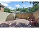 Relaxing patio area with outdoor furniture, brick pavers, and a wooden fence at 95 Mount Vernon Cir, Atlanta, GA 30338