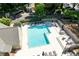 Aerial view of a community pool with sun loungers and a nearby gazebo at 95 Mount Vernon Cir, Atlanta, GA 30338