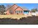 Spacious backyard with patio and seating area at 1500 Elena Dr, Mcdonough, GA 30253