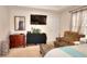 Bedroom featuring large window, neutral walls, and armoire at 1500 Elena Dr, Mcdonough, GA 30253