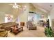 Bright living area with open floor plan; view to dining, kitchen, and staircase at 1500 Elena Dr, Mcdonough, GA 30253
