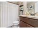 Bathroom featuring granite vanity, framed mirror and a shower with curtain at 316 Cranmore Pl, Villa Rica, GA 30180