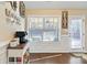 Cozy breakfast nook featuring a bright window with backyard views and a stylish door to the backyard at 316 Cranmore Pl, Villa Rica, GA 30180