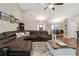 Inviting living room featuring a spacious layout, hardwood floors, and seamless flow to the dining area at 316 Cranmore Pl, Villa Rica, GA 30180