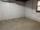 Unfinished basement with concrete walls, concrete floor and a window at 722 Thornapple Trl, Lawrenceville, GA 30046