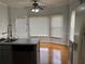 Bright breakfast nook with wood floors, ample windows, and neutral decor at 722 Thornapple Trl, Lawrenceville, GA 30046