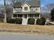 Charming two-story home featuring a welcoming front porch and well-maintained landscaping at 722 Thornapple Trl, Lawrenceville, GA 30046