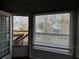 Bright sunroom with views of the deck and backyard, offering a relaxing space at 722 Thornapple Trl, Lawrenceville, GA 30046