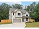 Beautiful two-story home with a well-maintained lawn and inviting curb appeal at 1511 New Hope Rd, Locust Grove, GA 30248