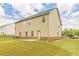 Expansive backyard featuring lush grass and beautiful exterior of a house at 300 Bianca Way, Mcdonough, GA 30253