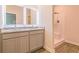 Modern bathroom featuring double sinks, granite counters, and a stand-up shower at 300 Bianca Way, Mcdonough, GA 30253