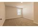 Bedroom with neutral carpet and white trim at 300 Bianca Way, Mcdonough, GA 30253