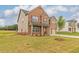 A traditional two-story home displays its brick and siding exterior with green lawn at 300 Bianca Way, Mcdonough, GA 30253