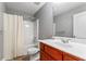 Bathroom featuring a vanity, toilet, and a shower with a white shower curtain at 308 Helena Pl, Mcdonough, GA 30252