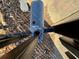 This image shows a Supra lockbox attached to the gate at 898 Oak Sw St # 3109, Atlanta, GA 30310
