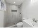 Bathroom showcasing the tile shower, toilet and sink at 1700 Shirley Sw St, Atlanta, GA 30310