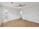 Bedroom with hardwood floors, a ceiling fan, and an en suite bathroom at 1700 Shirley Sw St, Atlanta, GA 30310