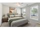 Bedroom with natural light, ceiling fan, and neutral-toned decor at 3331 Freedom Nw Lndg, Kennesaw, GA 30144