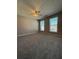 Bedroom with neutral carpet, light walls, ceiling fan and plenty of natural light at 3331 Freedom Nw Lndg, Kennesaw, GA 30144