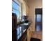 Kitchen featuring granite countertops, stainless steel sink, and a view to living area at 3331 Freedom Nw Lndg, Kennesaw, GA 30144