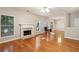 Spacious living room with fireplace, hardwood floors, and plenty of natural light at 3331 Freedom Nw Lndg, Kennesaw, GA 30144
