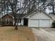 Charming single Gathering home with a two car garage and neutral color scheme at 4227 Sheppard Xing Way, Stone Mountain, GA 30083